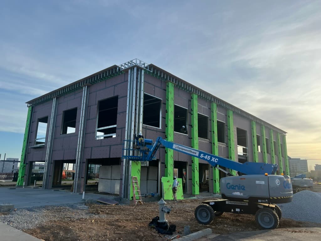 J&J Construction crew working on a commercial jobsite in Northwest Arkansas